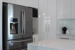 modern kitchen with steel fridge