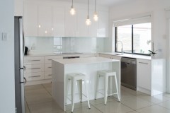 white kitchen with marble benchtop