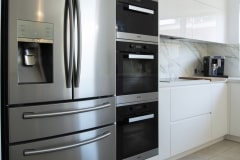 modern fridge in kitchen