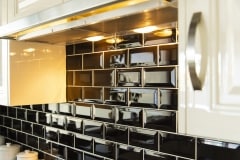 light turn on infront of black splashback